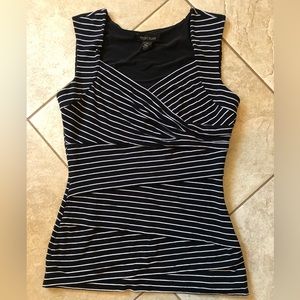 Slenderizing top from White House Black market. Size m Like new